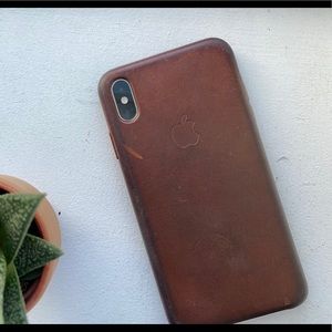 Worn out apple leather saddle brown case